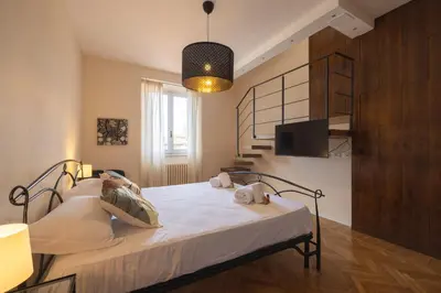 Letto o letti in una camera di Santa Croce Breath-taking Penthouse