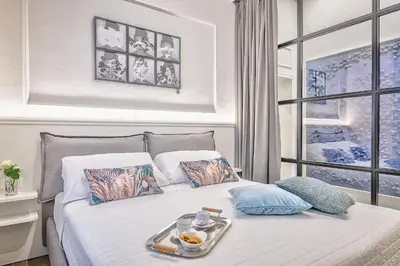 Letto o letti in una camera di Modern Art Suite in Florence