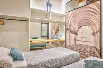 Letto o letti in una camera di Modern Art Suite in Florence