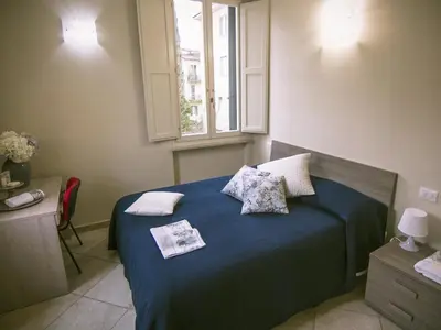 Letto o letti in una camera di Zula Affittacamere
