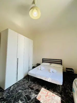 Letto o letti in una camera di BNB Centrale