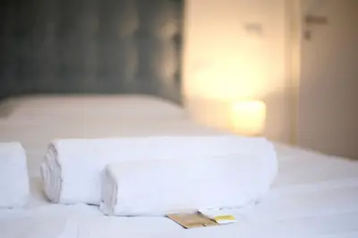 Letto o letti in una camera di Colombo - Boutique Home in Florence