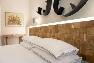 Letto o letti in una camera di Pier Capponi 17 Rooms & Suites