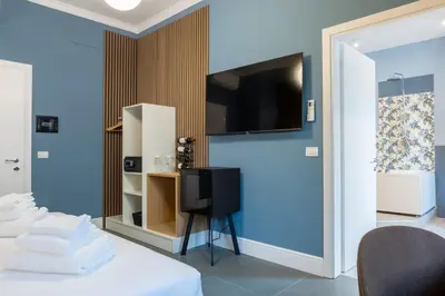TV o dispositivi per l'intrattenimento presso Pier Capponi 17 Rooms & Suites