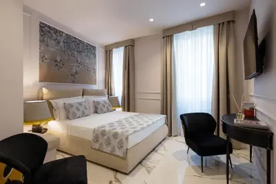 Letto o letti in una camera di Le Cinque Lampade Florence Suites