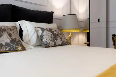 Letto o letti in una camera di Le Cinque Lampade Florence Suites
