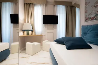 Letto o letti in una camera di Le Cinque Lampade Florence Suites