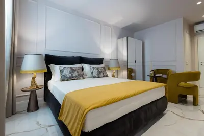 Letto o letti in una camera di Le Cinque Lampade Florence Suites