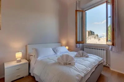 Letto o letti in una camera di Francesco Apartment by Mamo Florence