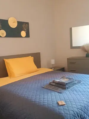 Letto o letti in una camera di La Divina guest house