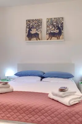 Letto o letti in una camera di Magico Risveglio Piazza Signoria