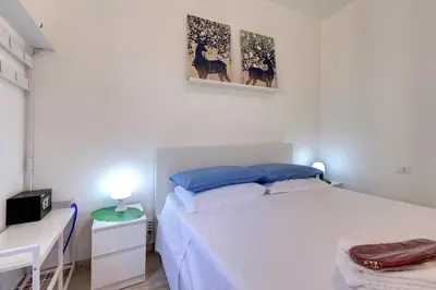 Letto o letti in una camera di Magico Risveglio Piazza Signoria