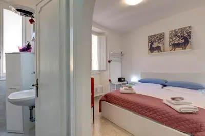 Letto o letti in una camera di Magico Risveglio Piazza Signoria