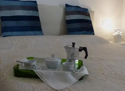 Letto o letti in una camera di Casa Gledi con vista su Fiesole