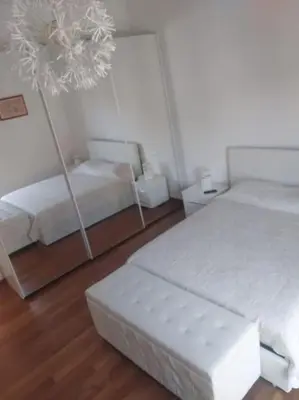 Letto o letti in una camera di Casa Gledi con vista su Fiesole