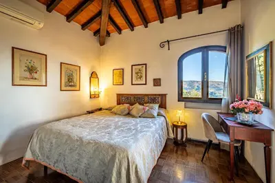 Letto o letti in una camera di Bed Breakfast La Paggeria