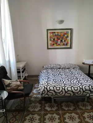 Letto o letti in una camera di Studio alle Antiche Mura