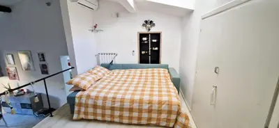 Letto o letti in una camera di Milla Apartment in art deco villa