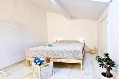 Letto o letti in una camera di Milla Apartment in art deco villa