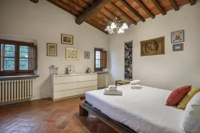 Letto o letti in una camera di Villa Laura