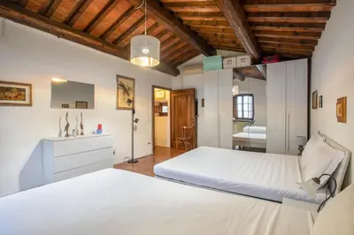 Letto o letti in una camera di Villa Laura