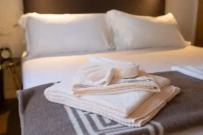 Letto o letti in una camera di Maison Costa dei Magnoli