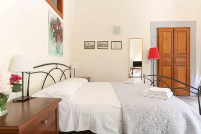 Letto o letti in una camera di In the Heart of Florence, Dante, with Private Terrace