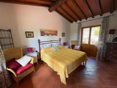 Letto o letti in una camera di Villetta Lilla'