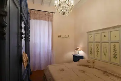 Letto o letti in una camera di Elegant Apartment Central Market SMN Station Duomo