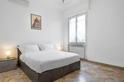 Letto o letti in una camera di Romina Apartment, Florence, Campo Marte