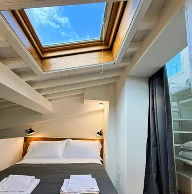Letto o letti in una camera di Red Lily Apartment