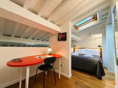 Letto o letti in una camera di Red Lily Apartment