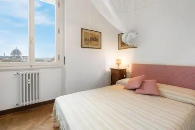 Letto o letti in una camera di Orto Botanico Apartment With Terrace And Dome View Florence