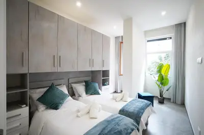 Letto o letti in una camera di Foster Apartments b&b