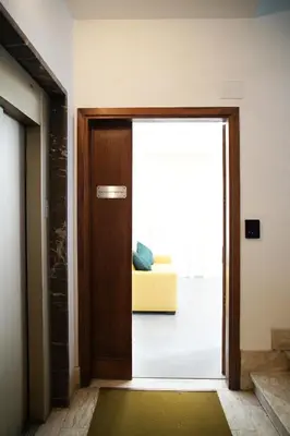 Area soggiorno di Foster Apartments b&b