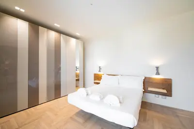 Letto o letti in una camera di Attico di Lusso vista Duomo a 2 passi dal centro
