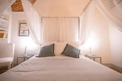 Letto o letti in una camera di Azzurra Elegant Apartment