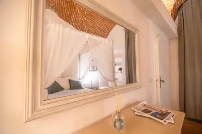 Letto o letti in una camera di Azzurra Elegant Apartment