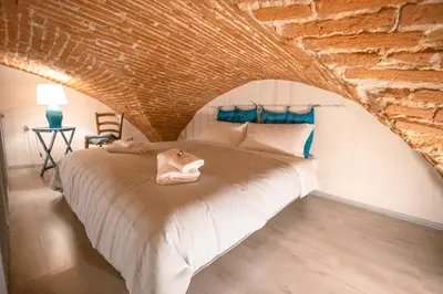 Letto o letti in una camera di Azzurra Elegant Apartment