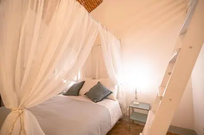 Letto o letti in una camera di Azzurra Elegant Apartment