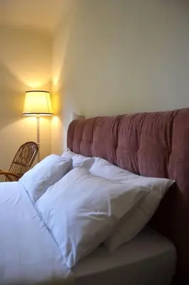 Letto o letti in una camera di Orto di Beatrice-Casa con Giardino