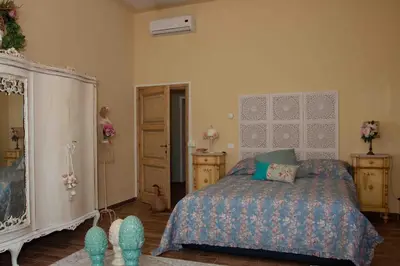 Letto o letti in una camera di Piazza Unità New Elegant Apartment SMN Station