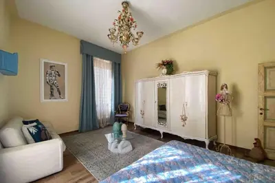 Letto o letti in una camera di Piazza Unità New Elegant Apartment SMN Station