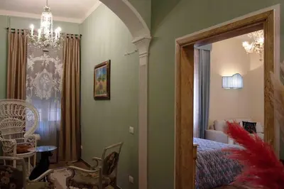 Letto o letti in una camera di Piazza Unità New Elegant Apartment SMN Station