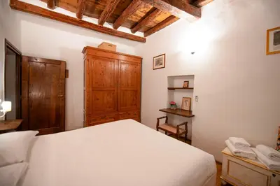 Letto o letti in una camera di Terme Apartment by Mamo Florence