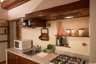 Cucina o angolo cottura di Terme Apartment by Mamo Florence
