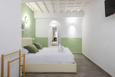 Letto o letti in una camera di UNYCA - Cozy Studio in Florence
