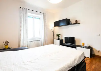 Letto o letti in una camera di Dimora Iacopo e Annalisa