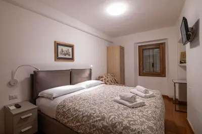 Letto o letti in una camera di In the heart of Florence