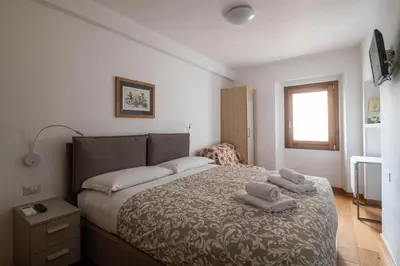 Letto o letti in una camera di In the heart of Florence
